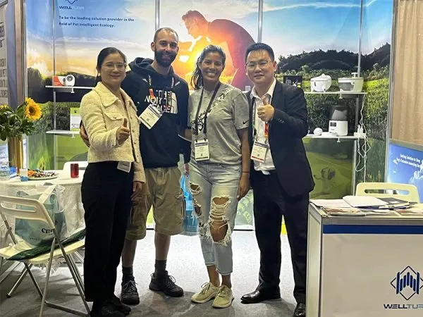 Wellturn booth and overseas customers at a North American pet expo